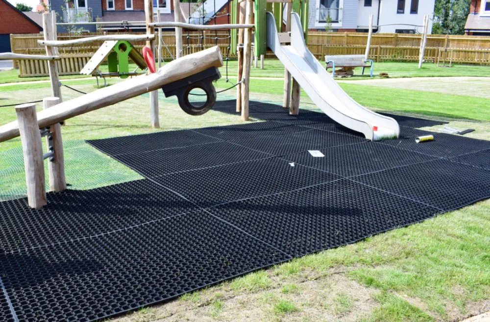 RubbaGrass Rubber Grass Matting - Being Installed in Local Playground
